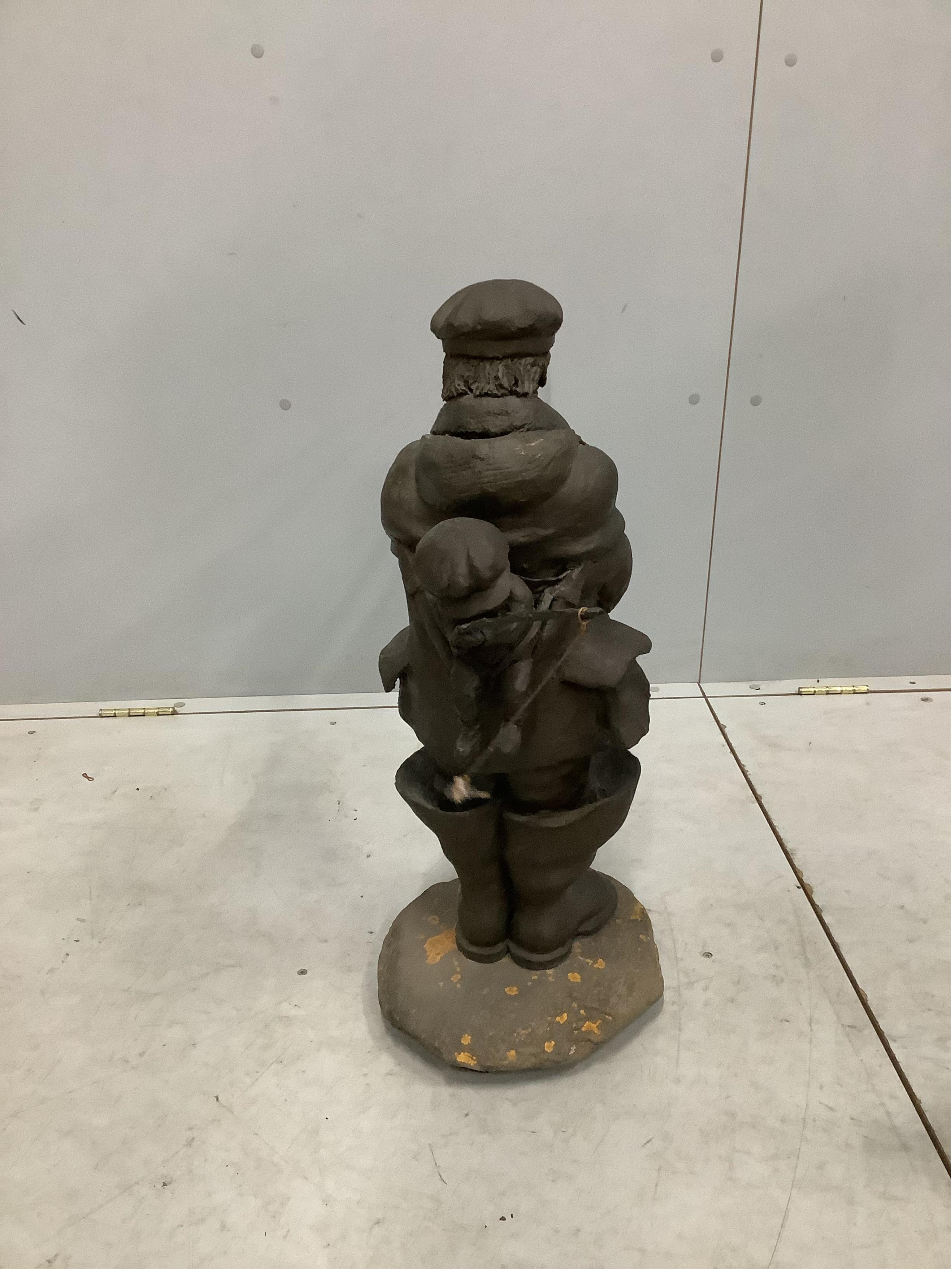 Norman Barrow (Modern British). A bronzed composition sculpture, fisherman and child, height 72cm. Condition - fair